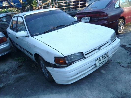 ขาย Mazda 323 ซีดาน เครื่องดี สภาพภายนอกพอได้ แก๊สไม่ได้ติด ภาษีขาดปี 56 เล่มพร้อมชุดโอน
