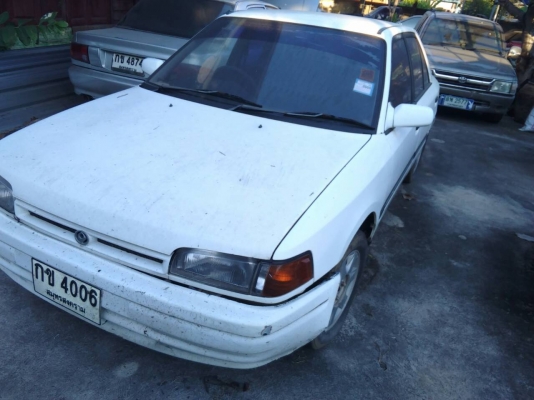 ขาย Mazda 323 ซีดาน เครื่องดี สภาพภายนอกพอได้ แก๊สไม่ได้ติด ภาษีขาดปี 56 เล่มพร้อมชุดโอน