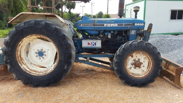 ขายรถไถ FORD 6610  2 เพลา ใบมีดดันหน้า 7 จาน เอกสารเล่มทะเบียน ราคา 380000