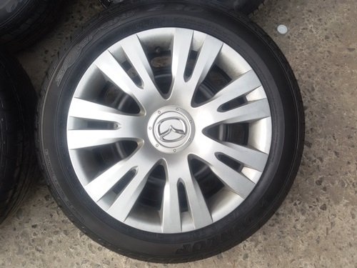 ขายล้อกะทะMAZDA ขอบ15 พร้อมยางและฝาครอบ  4 ล้อ