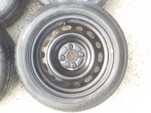 ขายล้อกะทะMAZDA ขอบ15 พร้อมยางและฝาครอบ  4 ล้อ