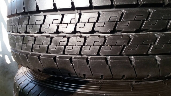 ยาง dunlop 215 70 15 ปี15ถอดป้ายแดง