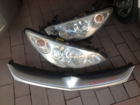 ไฟหน้าซีน่อนเเท้พร้อมกระจัง TOYOTA ESTIMA HYBRID ปี05เก่าญี่ปุ่นสภาพสวย