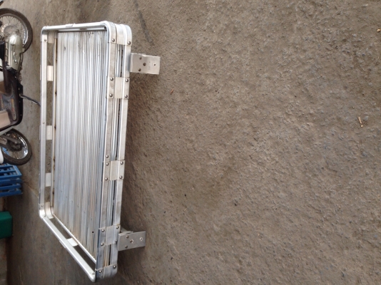 ขายแล็คหลังคามิเนียมvx80แปลงใส่รุ่นอืนได้แค่ขยับน๊อตกว้าง1.26ยาว1.57