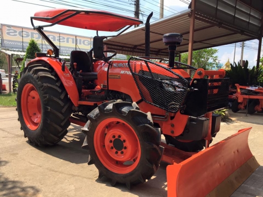 ขายรถไถ Kubota M7040 (4WD) พร้อมดันหน้า ผานบุกเบิกช้าง รถสวย พร้อมใช้งานครับ