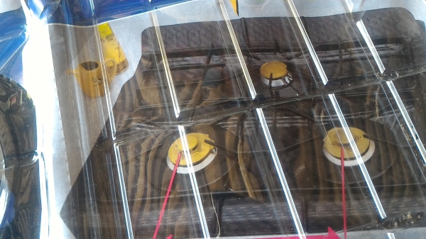 แผ่นอลูมีเนียมครอบเตาแก็ส จากญี่ปุ่น ขนาด 54*62 ซม. ใช้ได้กับช่องเตาที่มีขนาด  26-30 ซม.