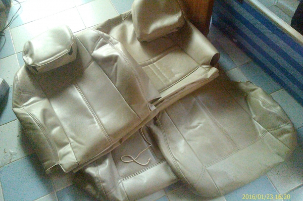 ชุดหุ้มเบาะหนังรถยนต์ สีครีม 1คู่