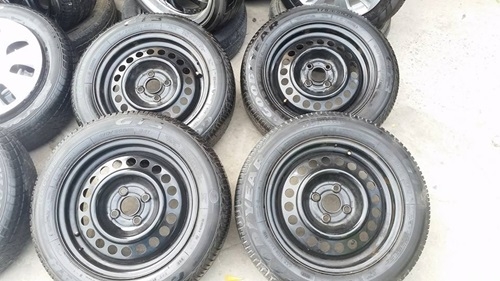 ขายล้อกะทะHONDA ขอบ15 4 รู100 พร้อมยางฝาครอบ 4 ล้อ