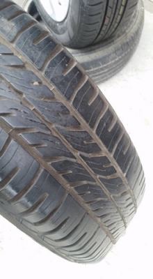 ขายล้อกะทะHONDA ขอบ15 4 รู100 พร้อมยางฝาครอบ 4 ล้อ