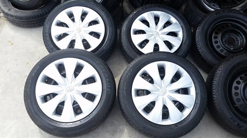 ขายล้อกะทะTOYOTA ขอบ15 4 รู100 พร้อมยางฝาครอบ 4  ล้อ