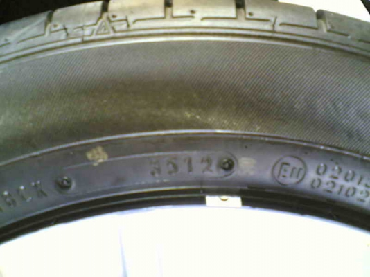 ขายล้อกระทะพร้อมยางและที่ครอบล้อ มิราจ ยาง Dunlop 165/65/14 ยางสัปดาห์ที่ 35/12 ลงพื้นไม่ถึง 500 โล