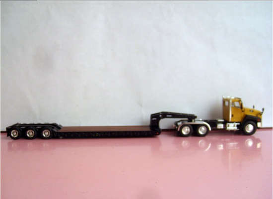 CAT CT660 Daycab with Trail-King Lowboy Trailer