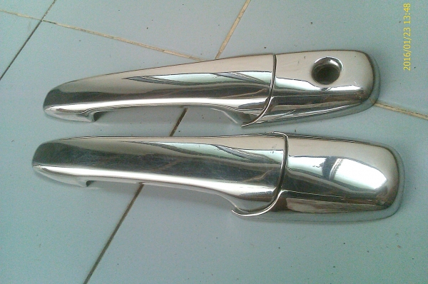 ครอบมือเปิดโคเมี่ยม mazda