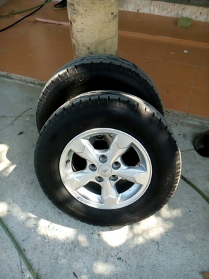 แม็กไทรทัน5รู พร้อมยางบริดโตน215/70/15ปี15 4เส้น