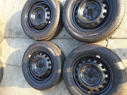 กะทะขอบ 14 4รู 100 พร้อมยาง bridgestoneปี 15 ชุดล่ะ 5500