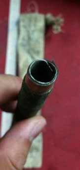 หลวงปู่ทิม วัดละหารไร่ จ.ระยอง  ตะกรุดพอกผง มีถุงเขียนยันต์เก่าเดิมๆ