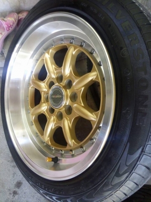 ล้อกล้วยไข่ขอบ 15 กว้าง 8 พร้อมยาง 9500 บาท