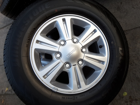 ล้อ isuzu 1.9 ddi ขอบ 15 พร้อมยาง bridgestone 215 70 15 ปี 16 ชุดล่ะ 16500