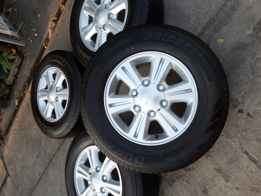 ล้อ isuzu 1.9 ddi ขอบ 15 พร้อมยาง bridgestone 215 70 15 ปี 16 ชุดล่ะ 16500