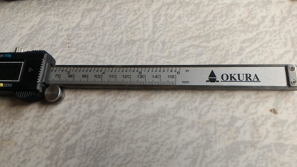 เวอร์เนียดิจิตอล ยี่ห้อ OKURA ระยะการทำงาน 150 มม. แสดงผลเป็นตัวเลย LCD สีดำ ทศนิยม 2 ตำแหน่ง
