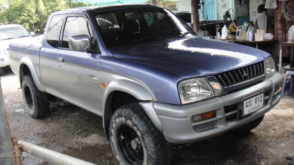 MITSUBISHI L200 STRADA 2.8 MEGACAB 4WD ปี2000 เครื่องดี2.8 ขับดี เกืยปกติ Tel 0862691888 หรือ 0864747394 คานหน้าเดิมไล้ขวามานิด สีบาง คัชชีสวย 165000฿