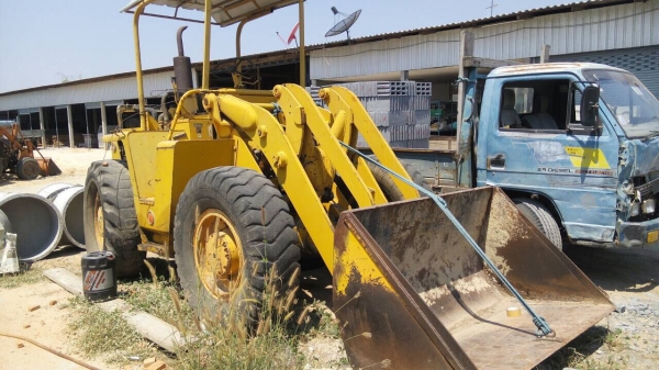 รถตักแมกซี่ MF33