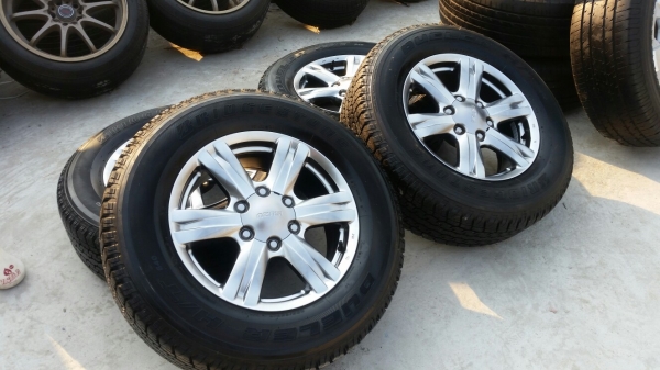 แม็กพร้อมยางอิซูซุ Mu-x ตัวพิเศษสีแบล็คโครม แม็กพร้อมยางอิซูซุ Mu-x ตัวพิเศษสีแบล็คโครม