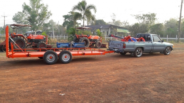 รับต่อรถเทรเลอร์ลากรถเกี่ยว