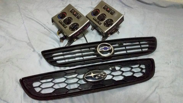 อะไหล่ ซาฟิร่า แผงสวิตซ์แอร์ตัวนอก // กระจังหน้า Subaru