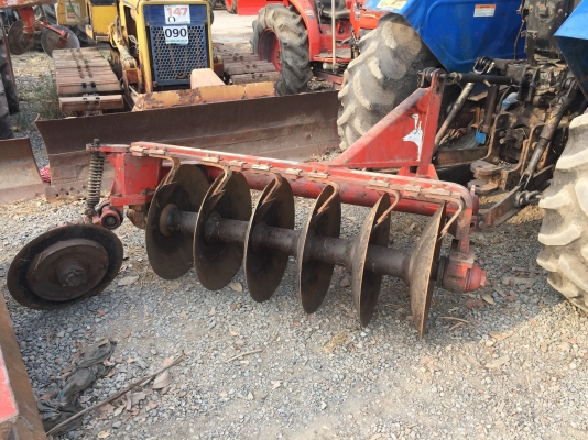 New Holland  TT75 พร้อมอุปกรณ์หน้าหลัง