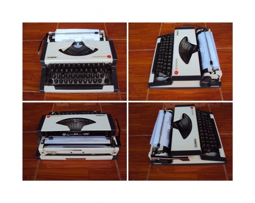 ขายเครื่องพิมพ์ดีด OLYMPIA  Traveller De Luxe