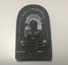 หลวงปู่ทวด หลังอาจารย์ทิม เนื้อนวะโลหะผิวไฟ