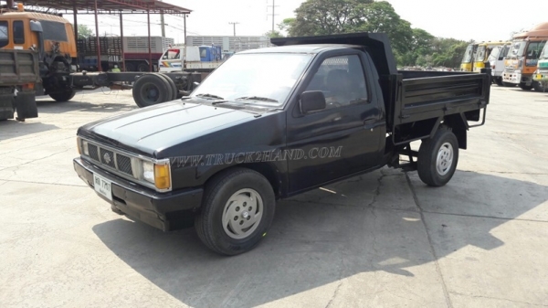 รถกระบะบรรทุก ยี่ห้อ NISSAN กระบะดัมพ์