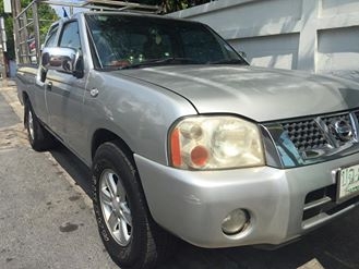 Nissan Frontier 2.7 Cab สีบรอนซ์เงิน ปี2002