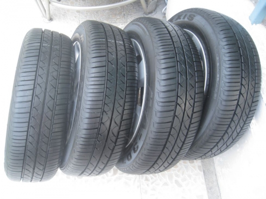 ขายล้อแม็กเดิม nissan march 15"x5.5" 4/100 et50 +ยางปี12(081-3747940 )