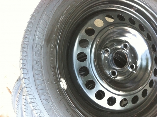 ขายกะทะเหล็กขอบ15พร้อมยางบริสโตน1756515และฝาครอบ 4 รู100