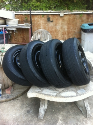 ขายกะทะเหล็กขอบ15พร้อมยางบริสโตน1756515และฝาครอบ 4 รู100