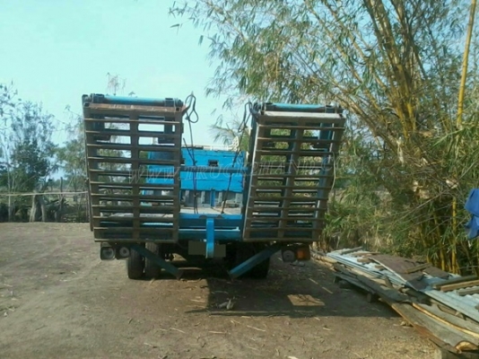 รถบรรทุก ISUZU หัวยาวพื้นเรียบเทเลอร์ สะพานยกได้ด้วยระบบไฮโดลิก