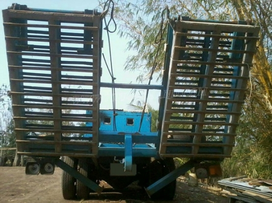 รถบรรทุก ISUZU หัวยาวพื้นเรียบเทเลอร์ สะพานยกได้ด้วยระบบไฮโดลิก