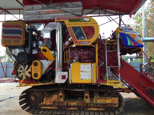 ขายรถเกี่ยวข้าวเกษตรพัฒนาจ้างช้างไวไฟปี 54