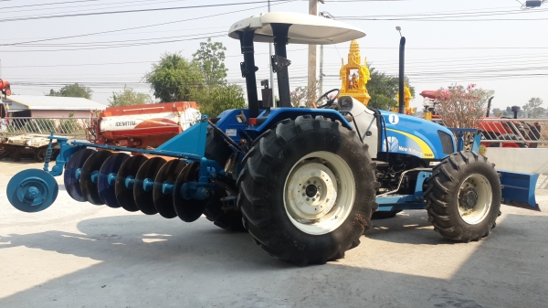 ** ราคา 1,050,000 ** NEW HOLLAND รุ่น T5060 ใบดัน+ผาน7 106 แรงม้า รถเดิมทั้งคัน สีเดิม เครื่องเดิม ไม่เคยทำ รถ 2,000 ชม.