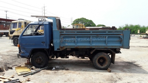 รถดั๊มอีซูซุ NPR จดทะเบียน 2543 รหัสแซซซี NPR58G ทะเบียนจดลักษณะ " ยกได้มีข้างเสริม "