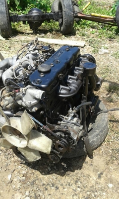 เครื่องอีซูสุพร้อมเกียร์ 4BC2 100 แรงม้า  พร้อมใช้งาน  มีใบคุมเครื่อง (หน้าเล่ม)