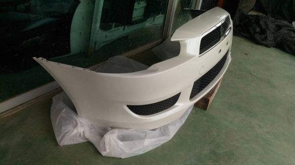 กันชนหน้าLancer EX สีขาว ของแท้ถอด