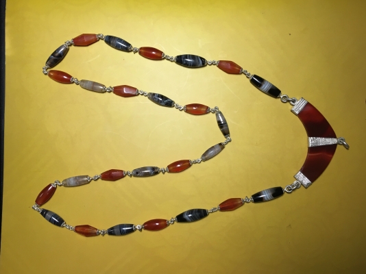 ลูกกำปัด เลี่ยมเงิน