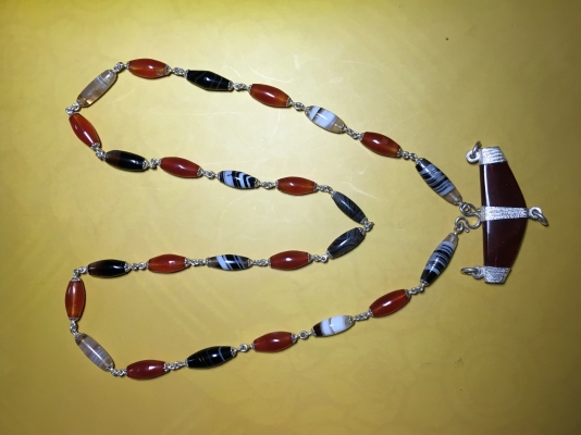 ลูกกำปัด เลี่ยมเงิน