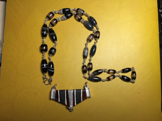 ลูกกำปัด เลี่ยมเงิน