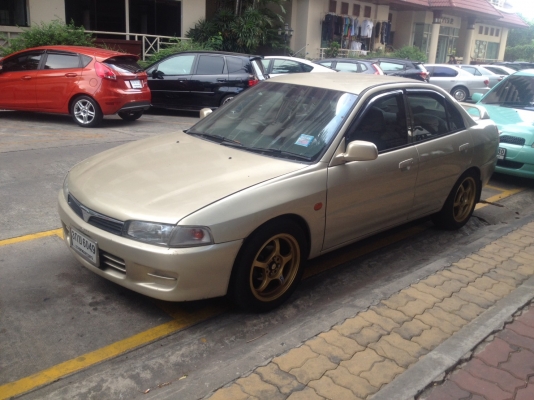 ขายMITSUBISHI LANCER ท้ายเบ๊น ปี 1997 สีทอง เกียร์ออโต้ ติดเเก๊ส LPGถังเเค็ปซูล