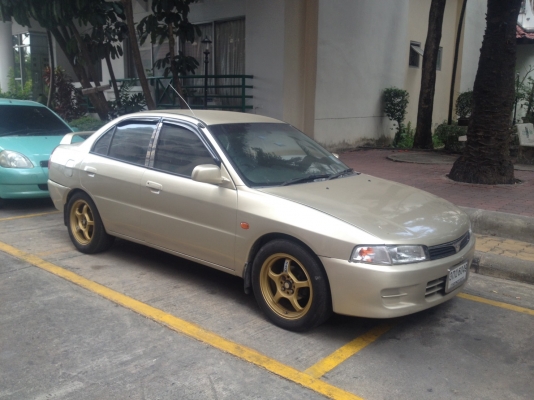ขายMITSUBISHI LANCER ท้ายเบ๊น ปี 1997 สีทอง เกียร์ออโต้ ติดเเก๊ส LPGถังเเค็ปซูล ขายMITSUBISHI LANCER ท้ายเบ๊น ปี 1997 สีทอง เกียร์ออโต้ ติดเเก๊ส LPGถังเเค็ปซูล