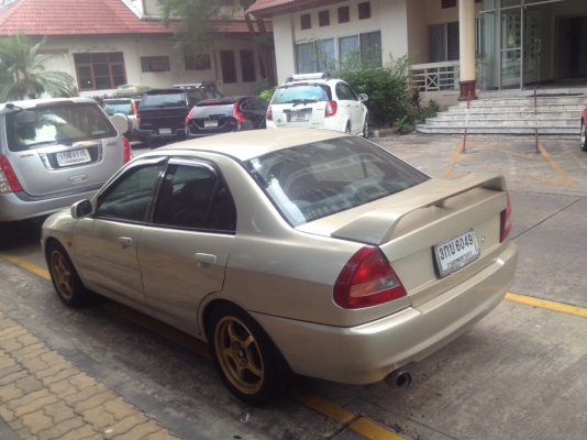 ขายMITSUBISHI LANCER ท้ายเบ๊น ปี 1997 สีทอง เกียร์ออโต้ ติดเเก๊ส LPGถังเเค็ปซูล
